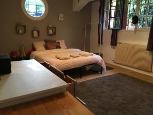Postel nebo postele na pokoji v ubytování Villa 10 personnes aux pieds des Pyrénées Pau + 18 fotografií