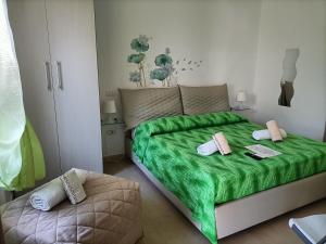 A bed or beds in a room at B&B Adele