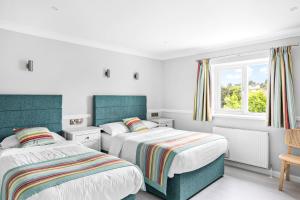 Waters Edge Hotel Torquay客房内的一张或多张床位