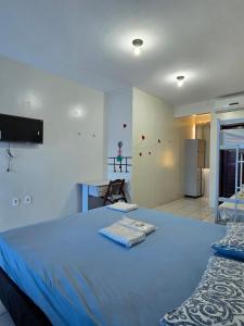 Ένα ή περισσότερα κρεβάτια σε δωμάτιο στο SOLAR HOSTEL PARNAIBA +100 φωτογραφίες