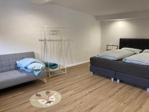 Ένα ή περισσότερα κρεβάτια σε δωμάτιο στο Ferienhaus Hohenleimbach