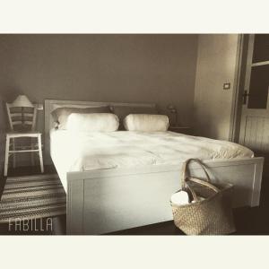 Posteľ alebo postele v izbe v ubytovaní La Scuderia Charming Rooms