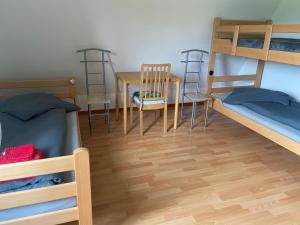 Postel nebo postele na pokoji v ubytování Ferienwohnung am Rhein