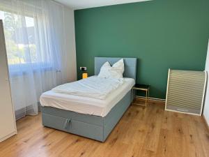 Фотография из галереи Ferienhaus Bremen Wunder-Grill-Relax Garten в городе Aumund