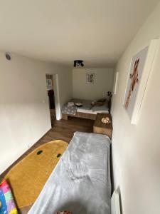 Postel nebo postele na pokoji v ubytování APARTMENT OWL
