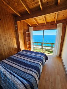 Postel nebo postele na pokoji v ubytování Al Mar Cabañas