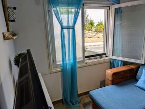 A seating area at Burero Beach Stay - Comfy - Near airport & Beaches