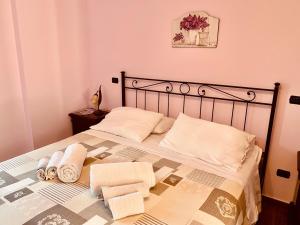 Postel nebo postele na pokoji v ubytování Agriturismo Torre Ercolana