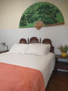 Cama ou camas em um quarto em Guanaaní Hostel