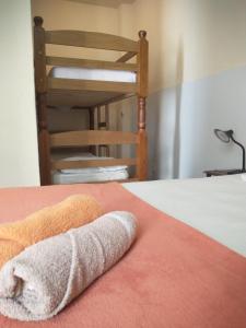Cama ou camas em um quarto em Guanaaní Hostel