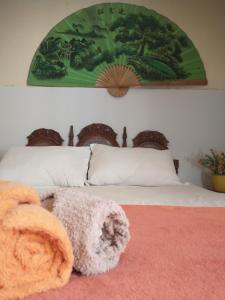 Cama ou camas em um quarto em Guanaaní Hostel