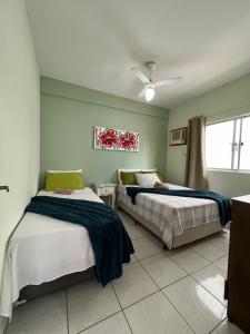 Katil atau katil-katil dalam bilik di Residencial Nereu