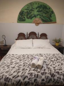 Cama ou camas em um quarto em Guanaaní Hostel