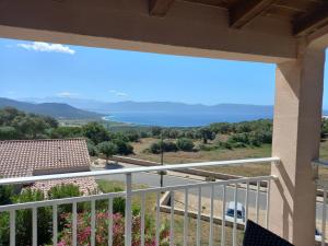 a balcony with a view of the ocean at A CASA DI PAULINA in Serra-di-Ferro