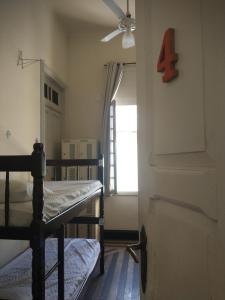 Cama ou camas em um quarto em Guanaaní Hostel
