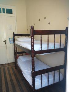 Cama ou camas em um quarto em Guanaaní Hostel