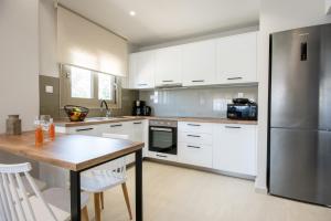 Kuchyň nebo kuchyňský kout v ubytování Mylos Modern Apartments,By Idealstay Experience
