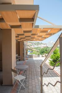Balkón nebo terasa v ubytování Mylos Modern Apartments,By Idealstay Experience