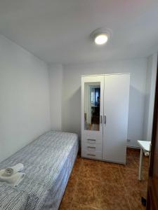 Postel nebo postele na pokoji v ubytování Apartamento Santander, Playa Sardinero