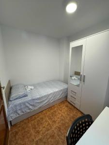 Postel nebo postele na pokoji v ubytování Apartamento Santander, Playa Sardinero