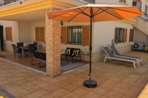 En balkon eller terrasse på Bungalow Casa Sol