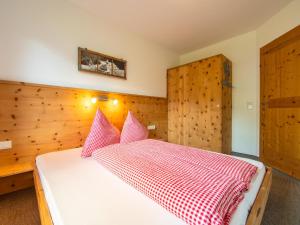 Łóżko lub łóżka w pokoju w obiekcie Blick zum Mayrhofen