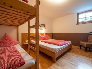 Łóżko lub łóżka w pokoju w obiekcie Blick zum Mayrhofen