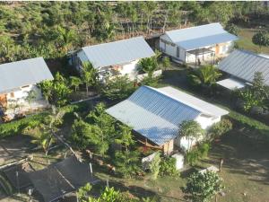 an overhead view of a house with blue roofs at Happy home in Huu +138 photos