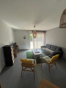 Istumisnurk majutusasutuses Les Buissonnets - Mer & Campagne - Maison de vacances - 2 chambres - 1 salon - 1 salle de bains - 1 cuisine - 72 m2