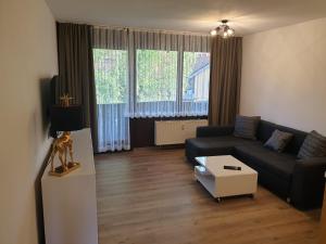 Χώρος καθιστικού στο Voll möbilierte Fehrienwohnung neben schönklinik in Bad aibling