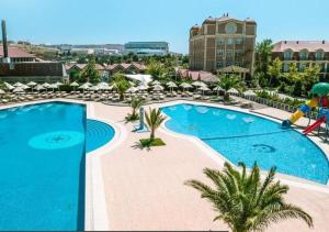 Πισίνα στο ή κοντά στο Green City Residence
