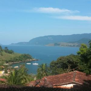 a view of a body of water with boats in it at Chalé do Saulo in Ilhabela