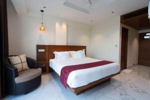 Postel nebo postele na pokoji v ubytování Hotel Vilvah