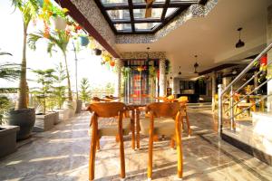 Aman Homestay, A Boutique Hotel的阳台或露台