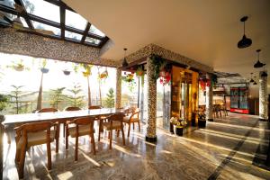 Aman Homestay, A Boutique Hotel餐厅或其他用餐的地方