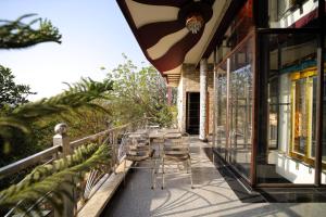 Aman Homestay, A Boutique Hotel的阳台或露台