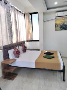 Postel nebo postele na pokoji v ubytování Hotel pine house