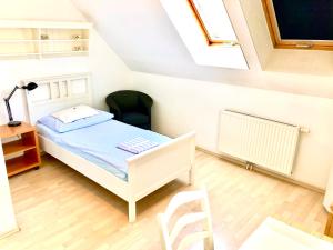 Postel nebo postele na pokoji v ubytování Gästezimmer Puzwidu