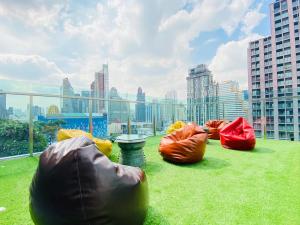 a group of bags sitting on top of a building at Civic Horizon Hotel & Residence in Bangkok