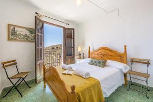 Postel nebo postele na pokoji v ubytování Casa La Prensa - Alpujarra