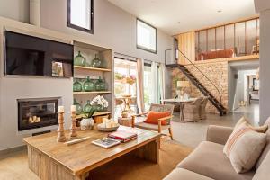 Et opholdsområde på Villa Charming House