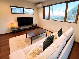 Μια τηλεόραση ή/και κέντρο ψυχαγωγίας στο TAITO BEACH HOUSE