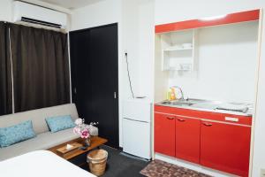 Kuchyň nebo kuchyňský kout v ubytování Royal Heights Sakuragawa Condominium