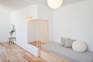 Postel nebo postele na pokoji v ubytování hoho 高松駅 港近くの1日1組限定の貸切宿