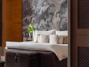 Cama o camas de una habitación en The Chedi Andermatt