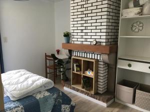 Postel nebo postele na pokoji v ubytování Chez Loulou chambre indépendante