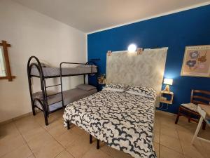 A bed or beds in a room at Agriturismo Corte San Girolamo