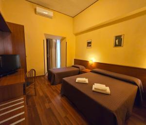 TV a/nebo společenská místnost v ubytování Hotel Azzurra