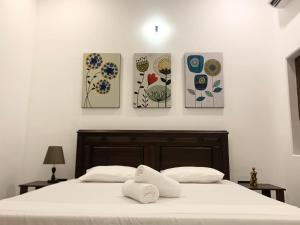 Voodi või voodid majutusasutuse Leena Holiday Home toas