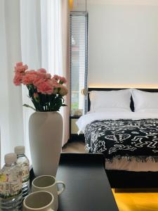 Postel nebo postele na pokoji v ubytování 山田心精品民宿 Valley Heart Inn